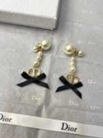 Pearl and bow earrings - 图片 2