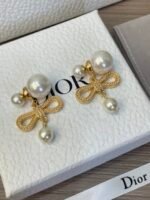 mental Pearl and bow earrings