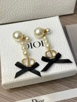 Pearl and bow earrings - 图片 5